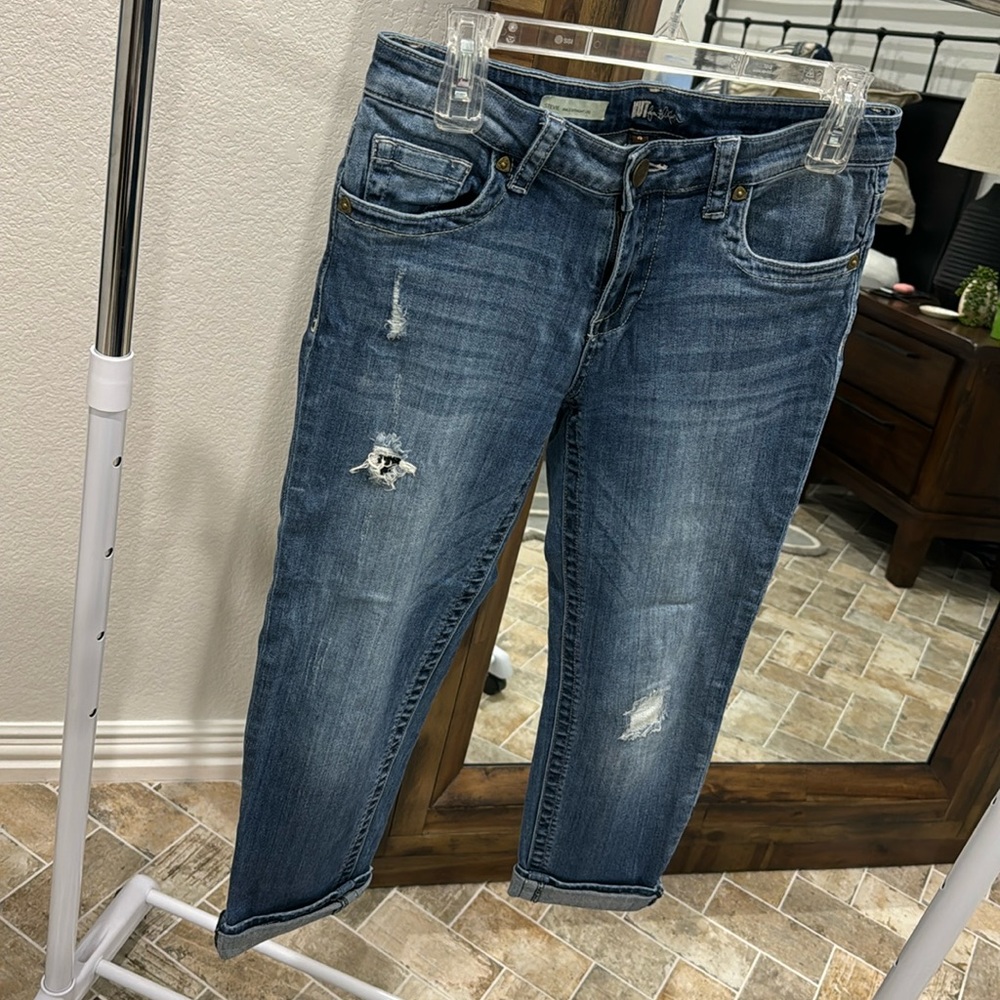 Kit from the Kloth Lightly distressed blue jeans